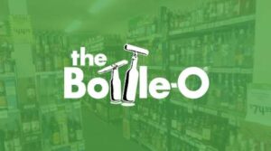 Graphic with the Bottle-O logo with shelves of wine in the background